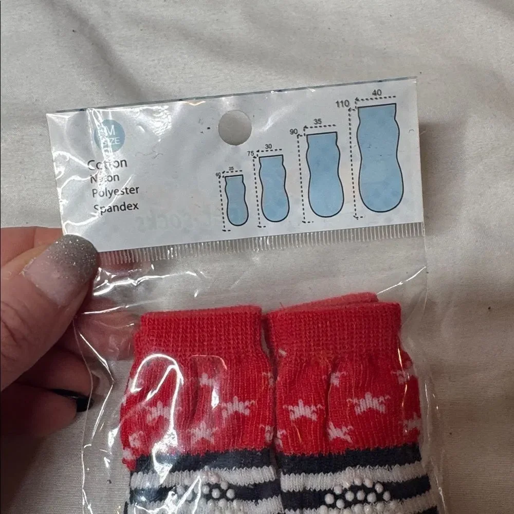 Three Sets Of Dog Socks. Size Medium. New.